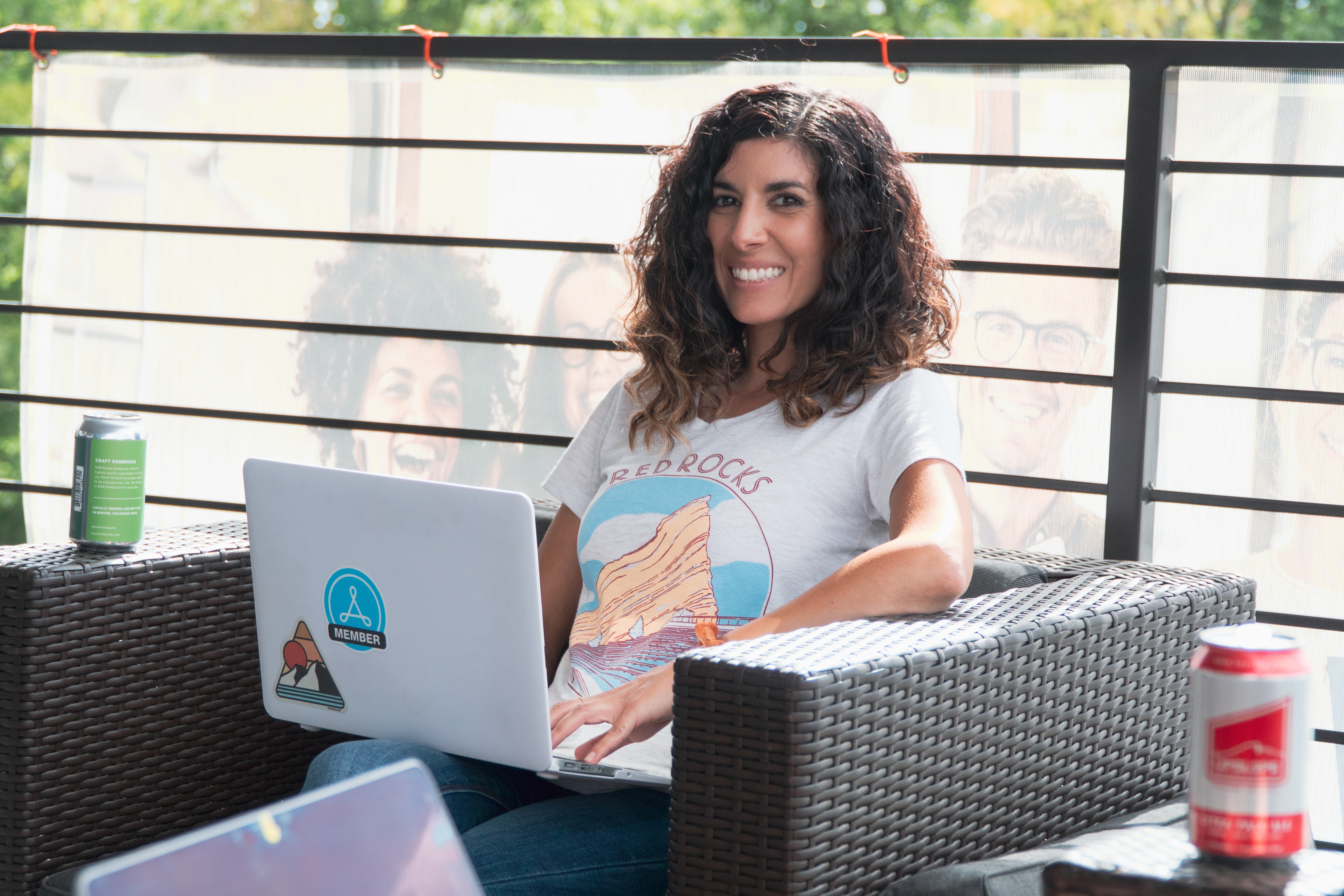 Creative Density Coworking in Park Hill on Patio - Nina remote worker Phone booths at Park Hill Denver Coworking Space
